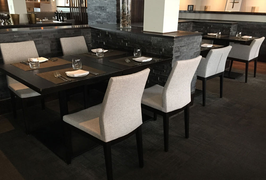 Pasha Wood Dining Chair by SohoConcept, showing wood chairs with table in live shot.