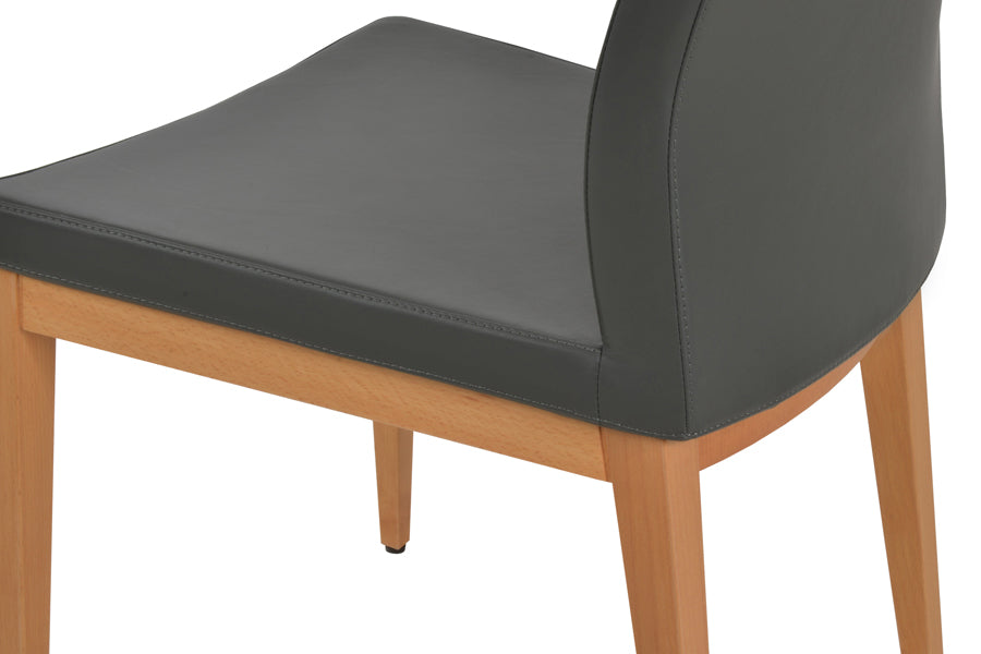Pasha Wood Dining Chair by SohoConcept, showing closeup view of wood chair.