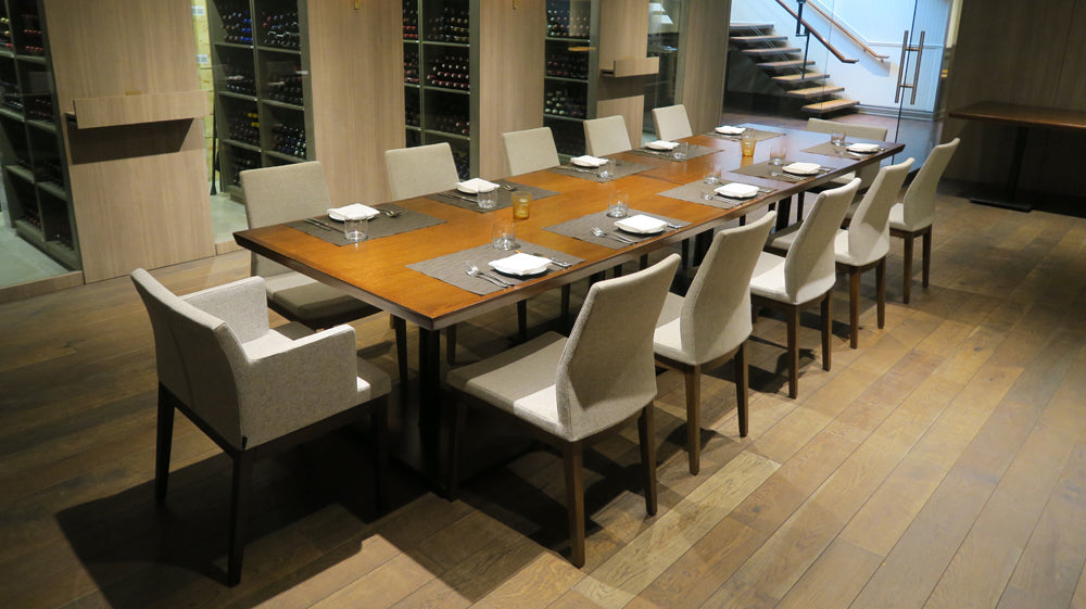 Pasha Wood Dining Chair by SohoConcept, showing wood chairs with table in live shot.