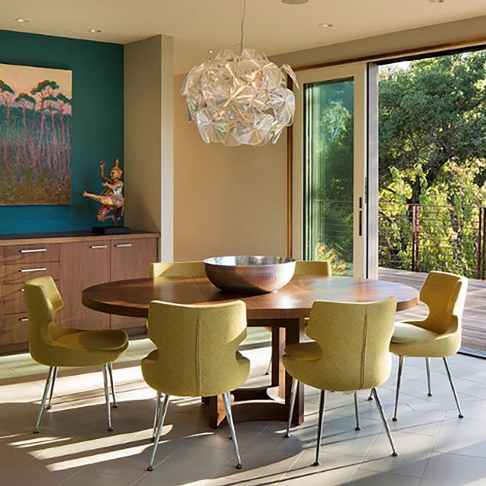 Patara Metal Dining Chair by SohoConcept, showing metal dining chairs with table in live shot.