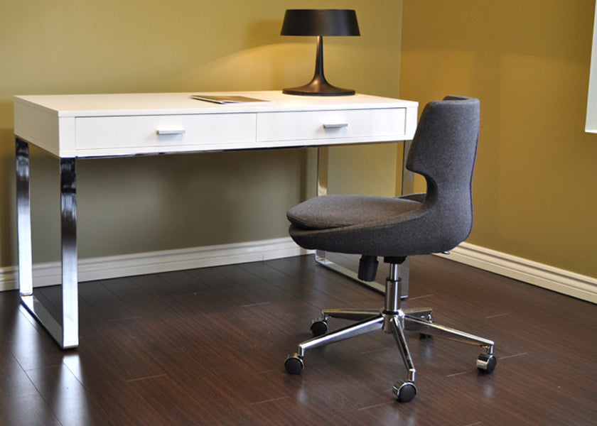 Patara Office Chair by sohoConcept, shown in dark grey wool with desk.