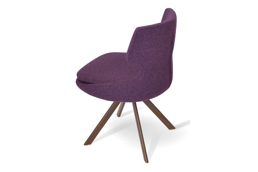 Patara Sword Dining Chair by sohoConcept, shown in deep maroon camira wool.