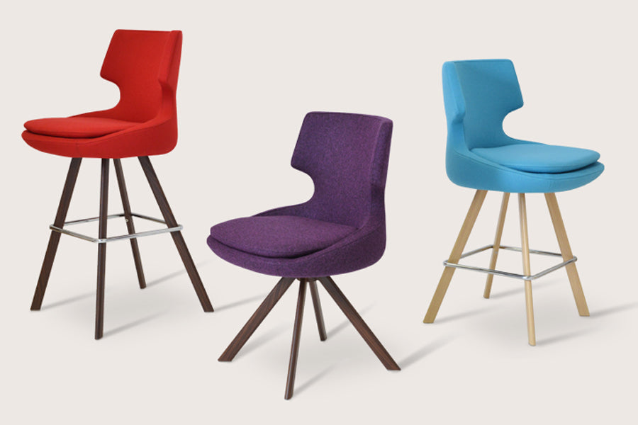 Patara Sword Dining Chair by sohoConcept, shown in multiple fabric.
