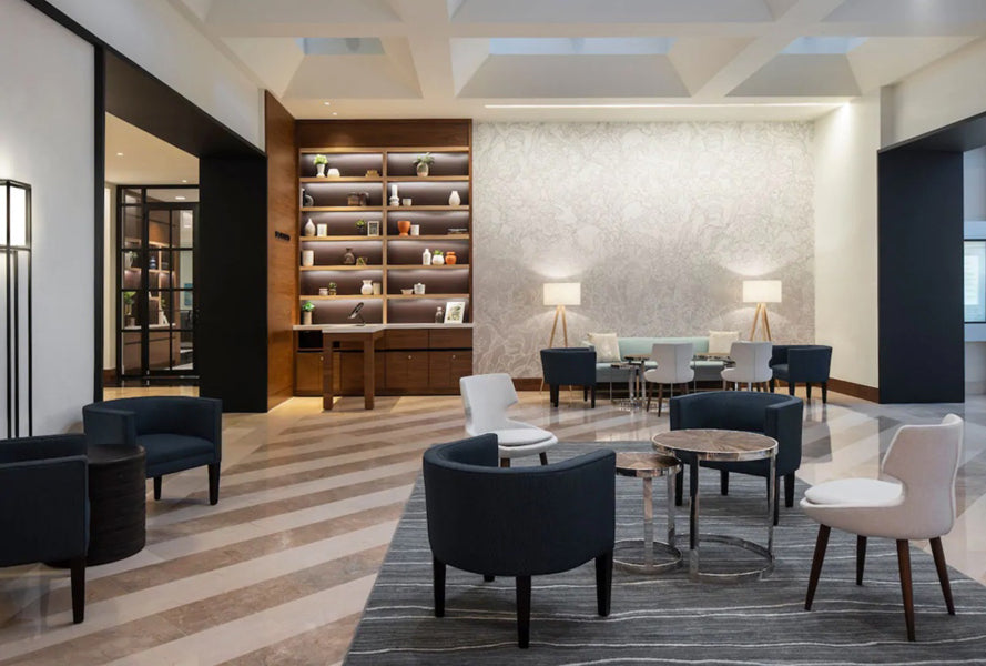 Patara Wood Dining Chair by SohoConcept, showing wood dining chairs with table in live shot.
