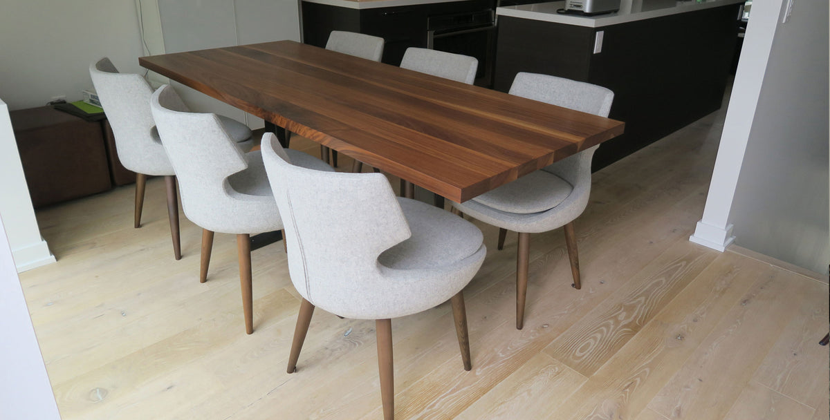 Patara Wood Dining Chair by SohoConcept, showing patara wood dining chairs in live shot.