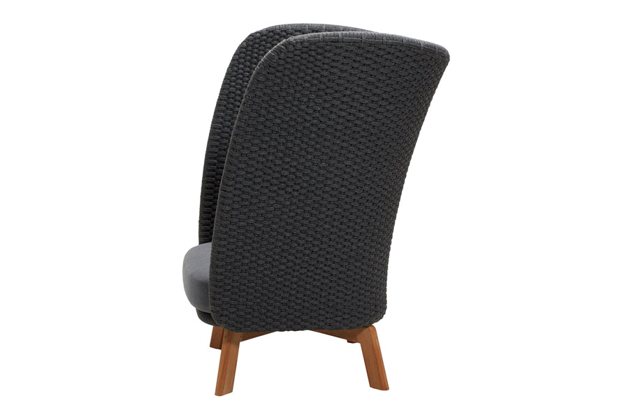 Peacock Wing Highback Chair with Teak Legs by Cane-Line, showing side view of peacock wing highback chair in teak/dark grey soft rope.