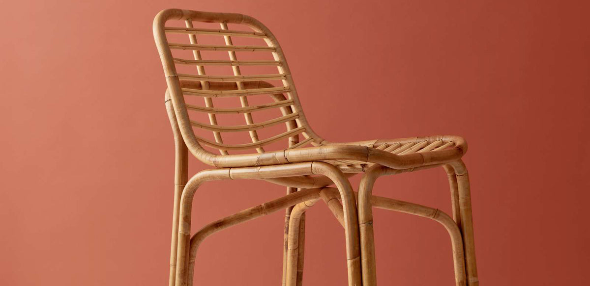 Peak Rattan Dining Chair by Cane-Line, showing peak rattan dining chair in live shot.