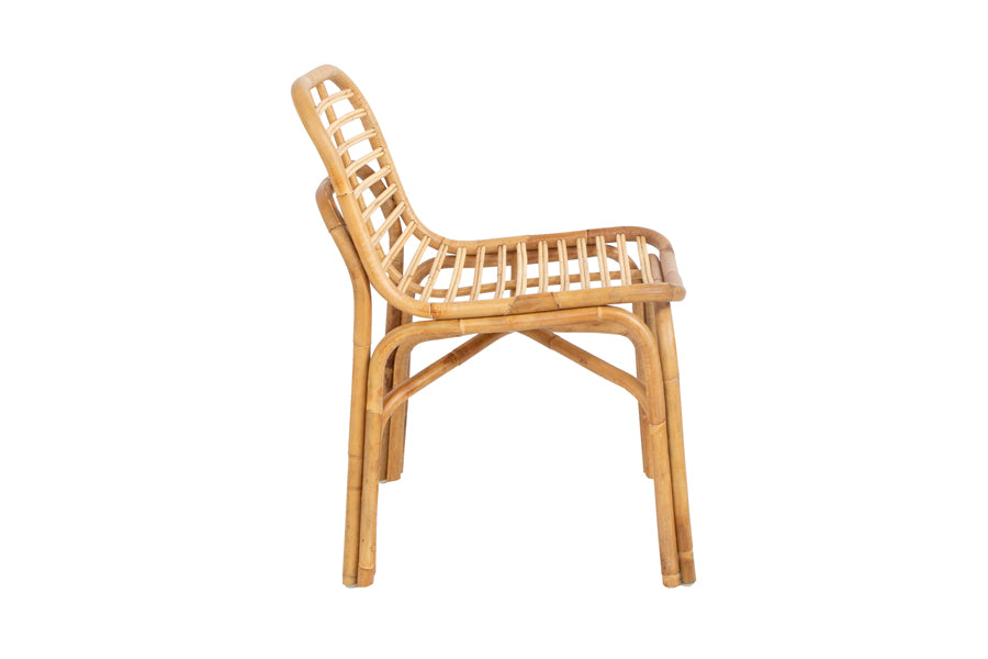 Peak Rattan Dining Chair by Cane-Line, showing side view of peak rattan dining chair in natural rattan.