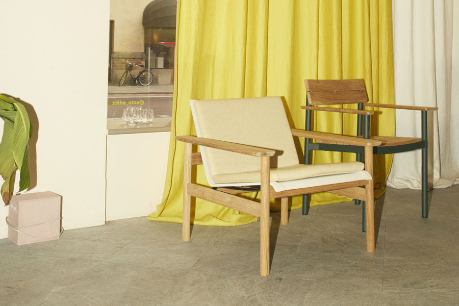 Pelago Armchair by Skagerak, showing pelago armchair in live shot.