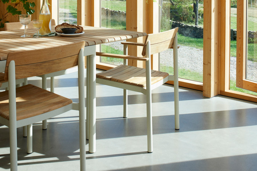 Pelago Armchair by Skagerak, showing pelago armchair in live shot.