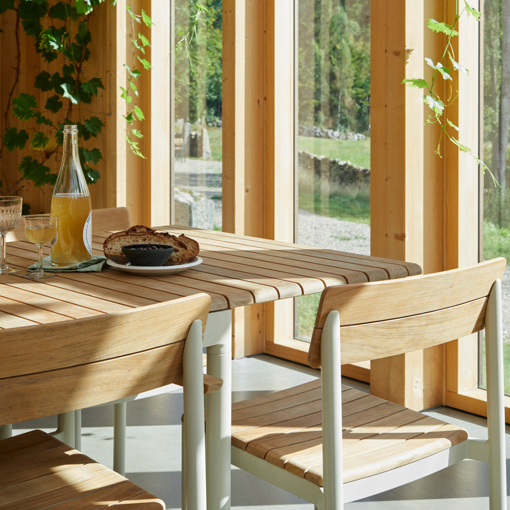 Pelago Armless Chair by Skagerak, showing pelago armless chair in live shot.