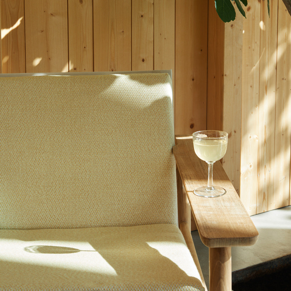 Pelago Lounge Chair by Skagerak, showing closeup view of pelago lounge chair in live shot.