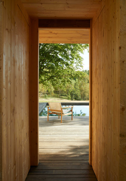 Pelago Lounge Chair by Skagerak, showing pelago lounge chair in live shot.