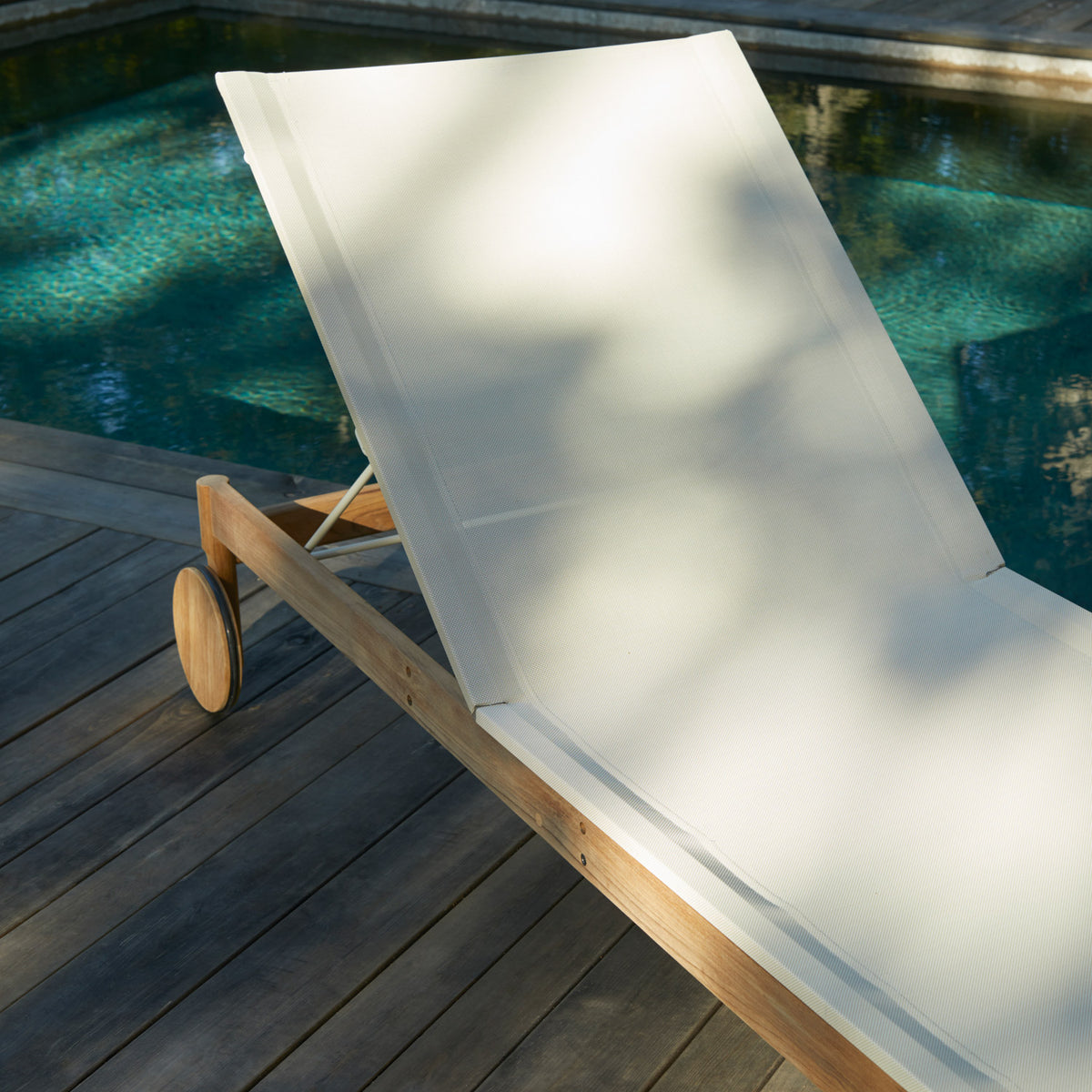 Pelago Sunbed by Skagerak, showing closeup view of pelago sunbed in live shot.