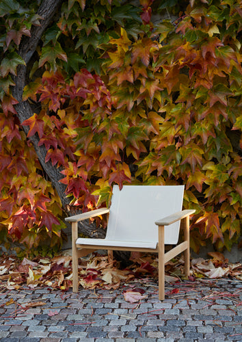 Pelagus Oudoor Lounge Chair by Skagerak, showing pelagus oudoor lounge chair in live shot.