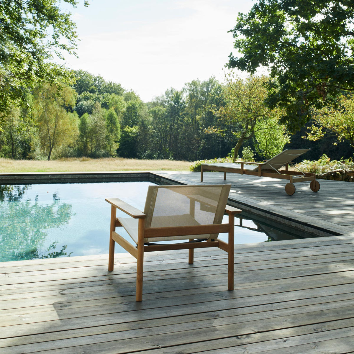 Pelagus Oudoor Lounge Chair by Skagerak, showing pelagus oudoor lounge chair in live shot.