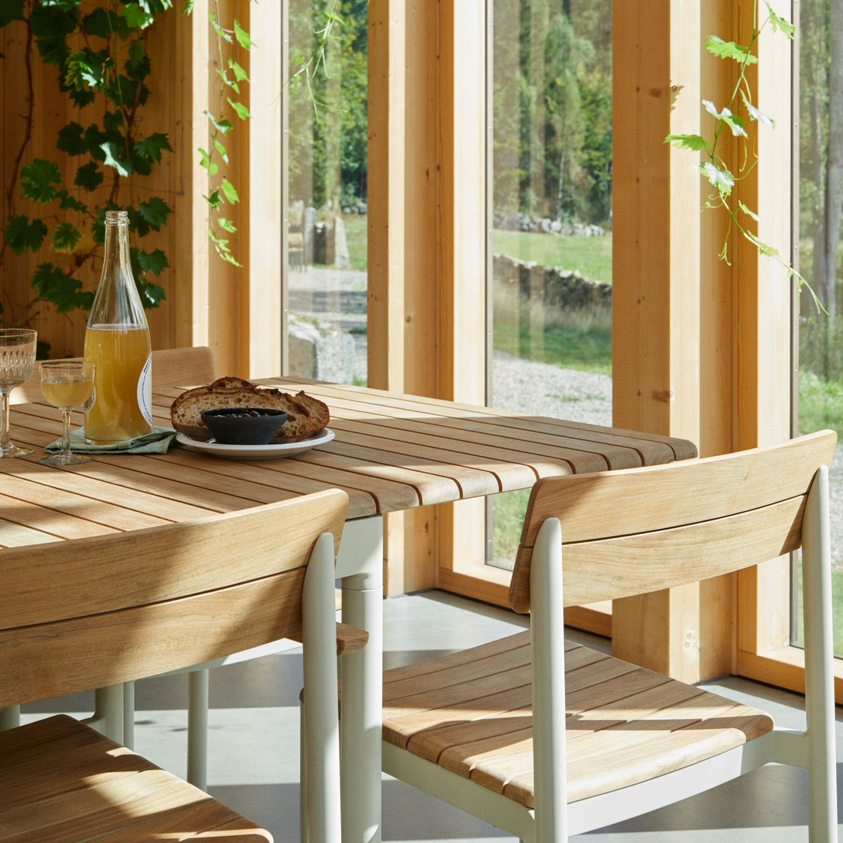Pelagus Outdoor Table by Skagerak, showing closeup view of pelagus outdoor table in live shot.