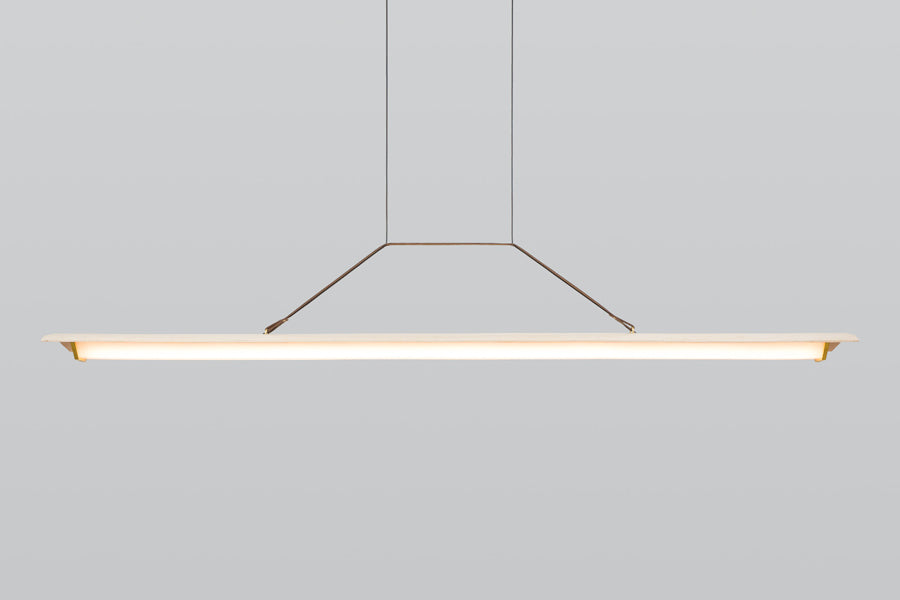 Penna 64" LED Pendant by Cerno, showing front view of penna 64" led pendant in brushed brass metal + white washed oak wood.