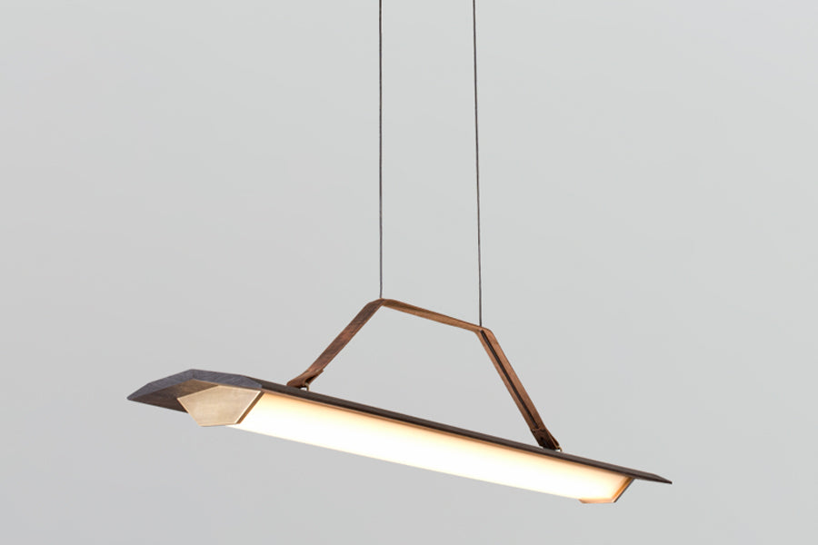 Penna 64" LED Pendant by Cerno, showing side view of penna 64" led pendant in brushed brass metal + walnut wood.