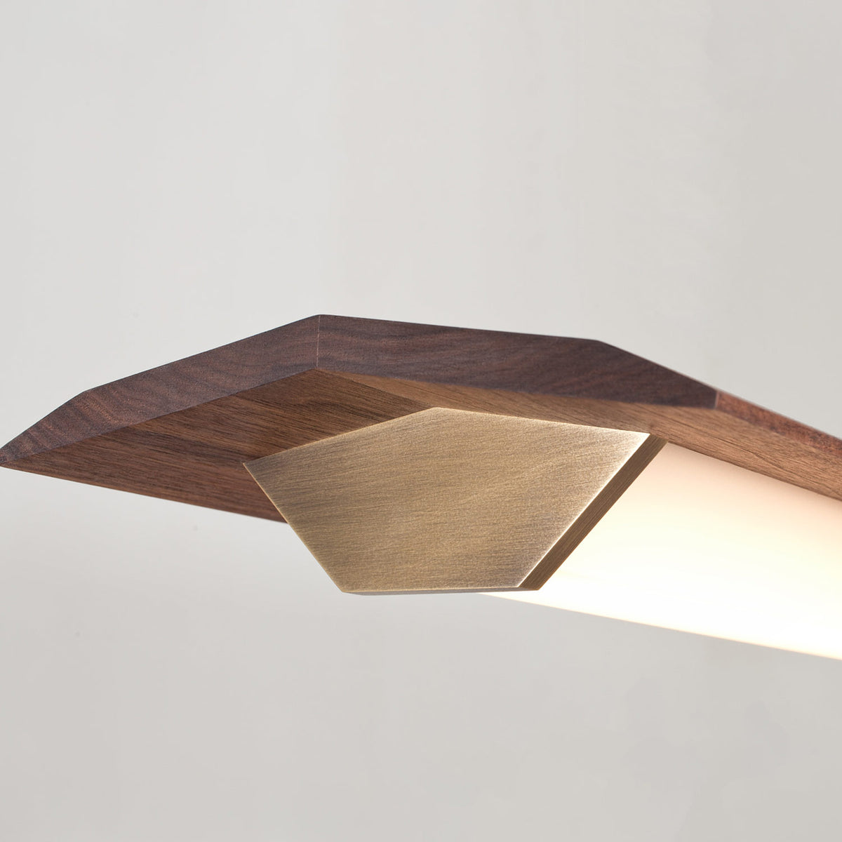 Penna 40" LED Pendant by Cerno, showing detail view of penna 40" led pendant in brushed brass metal + walnut wood.