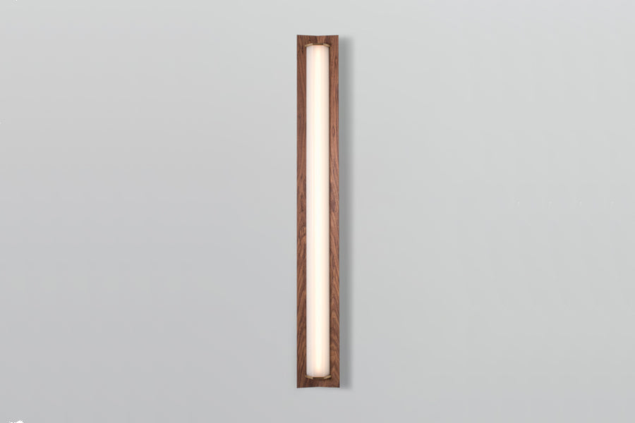 Penna LED Sconce by Cerno, showing front view of penna led sconce in 40", brushed brass metal + walnut wood.