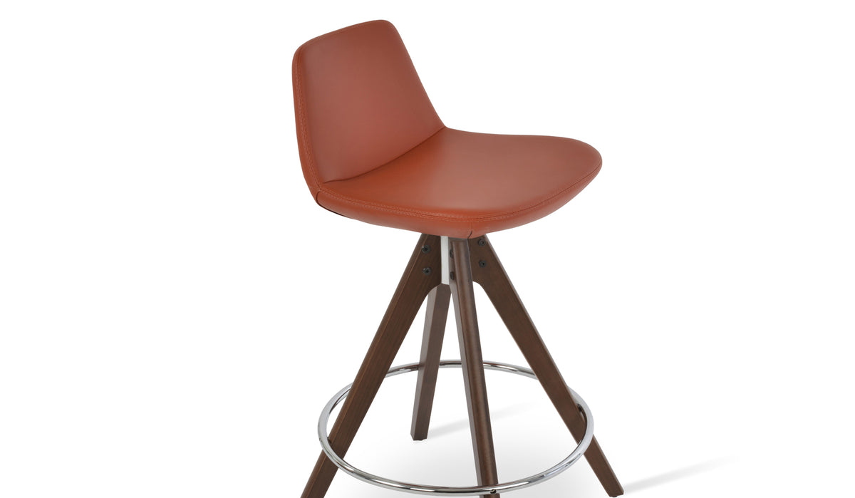 Pera Pyramid Swivel Counter Stool by SohoConcept, showing angle view of pramid swivel counter stool in dark red ppm with beech walnut wood.