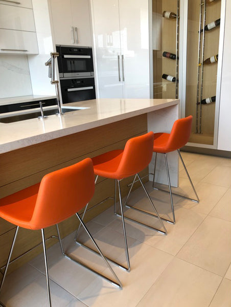 Pera Wire Bar Stool by SohoConcept, showing wire stools in live shot.