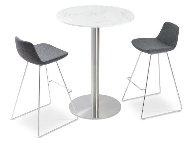 Pera Wire Counter Stool by SohoConcept, showing wire stools with round table.