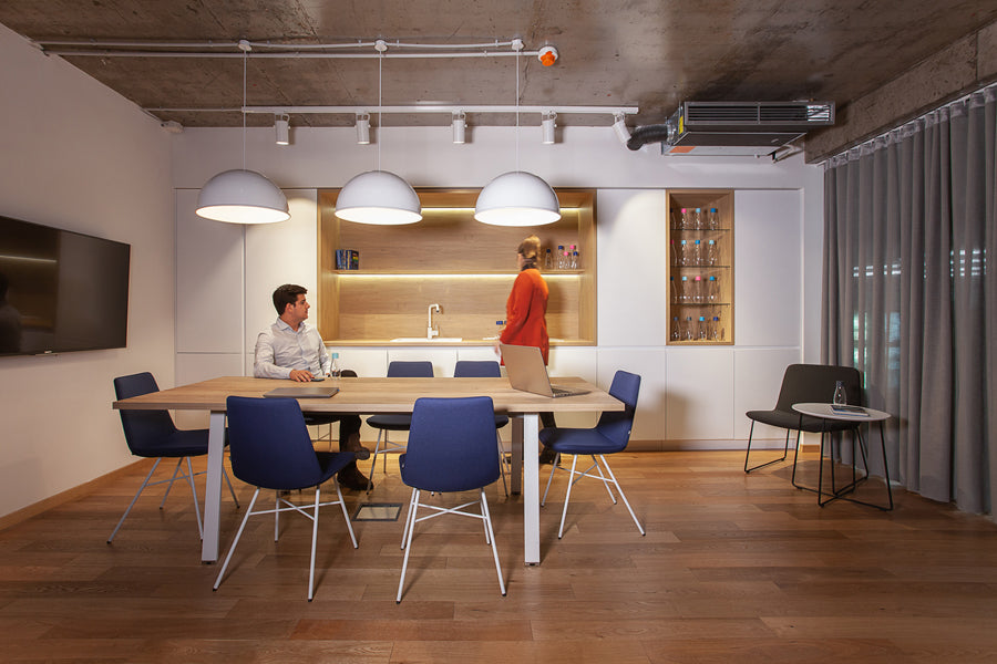 Pera X Chair by B&T, showing pera x chairs in live shot.