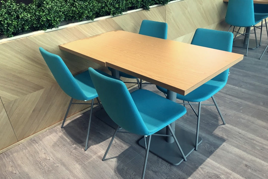 Pera X Chair by B&T, showing pera x chairs in live shot.