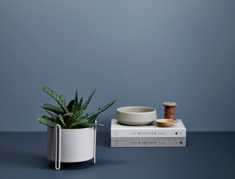 Pidestall Planter by Woud, showing planter in live shot.