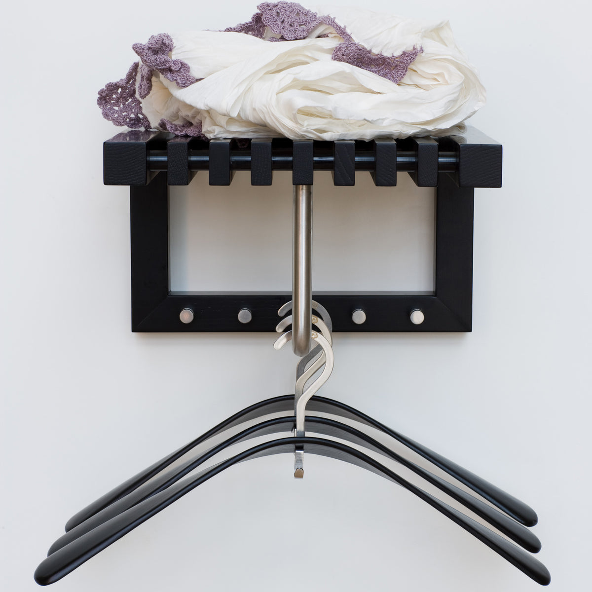 Pilot Coat Hanger by Skagerak, showing pilot coat hangers in live shot.