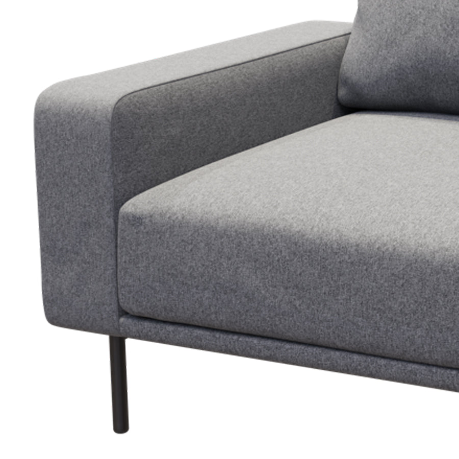 Piu Armchair by B&T, showing closeup view of view of piu armchair in light gray nino fabric.
