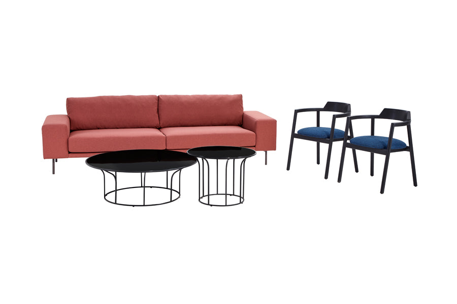 Piu Sofa by B&T, showing front view of piu sofa in red nino fabric with chairs & tables.
