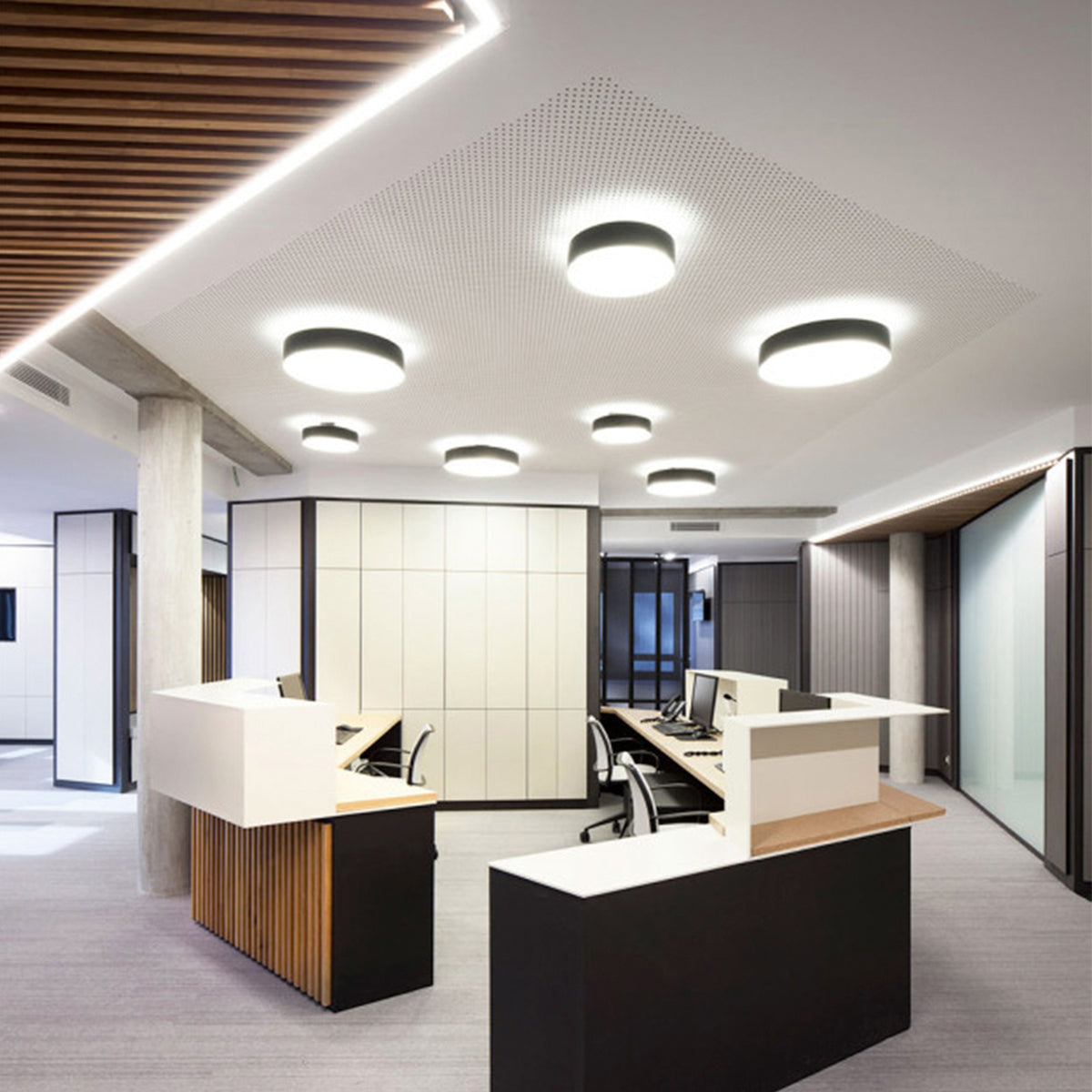 Plaff-On IP54 Wall/Ceiling Lamp by Marset, showing plaff-on ip54 wall/ceiling lamps in live shot.