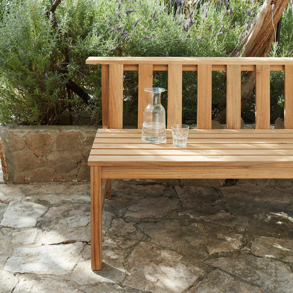Plank Bench 144 by Skagerak, showing side view of plank bench 144 in live shot.
