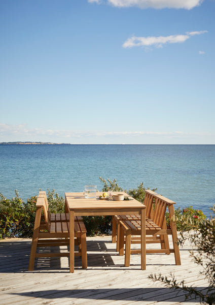 Plank Outdoor Chair by Skagerak, showing plank outdoor chair in live shot.