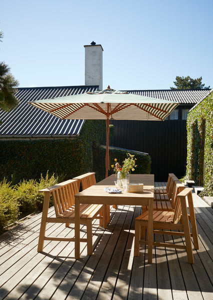Plank Outdoor Table by Skagerak, showing plank outdoor table in live shot.