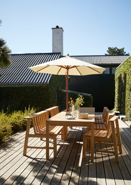 Plank Outdoor Table by Skagerak, showing plank outdoor table in live shot.