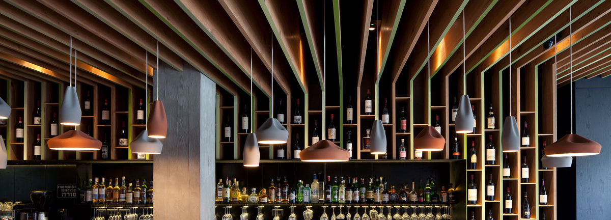 Pleat Box Pendant by Marset, showing pleat box ø17.32" pendants in live shot.