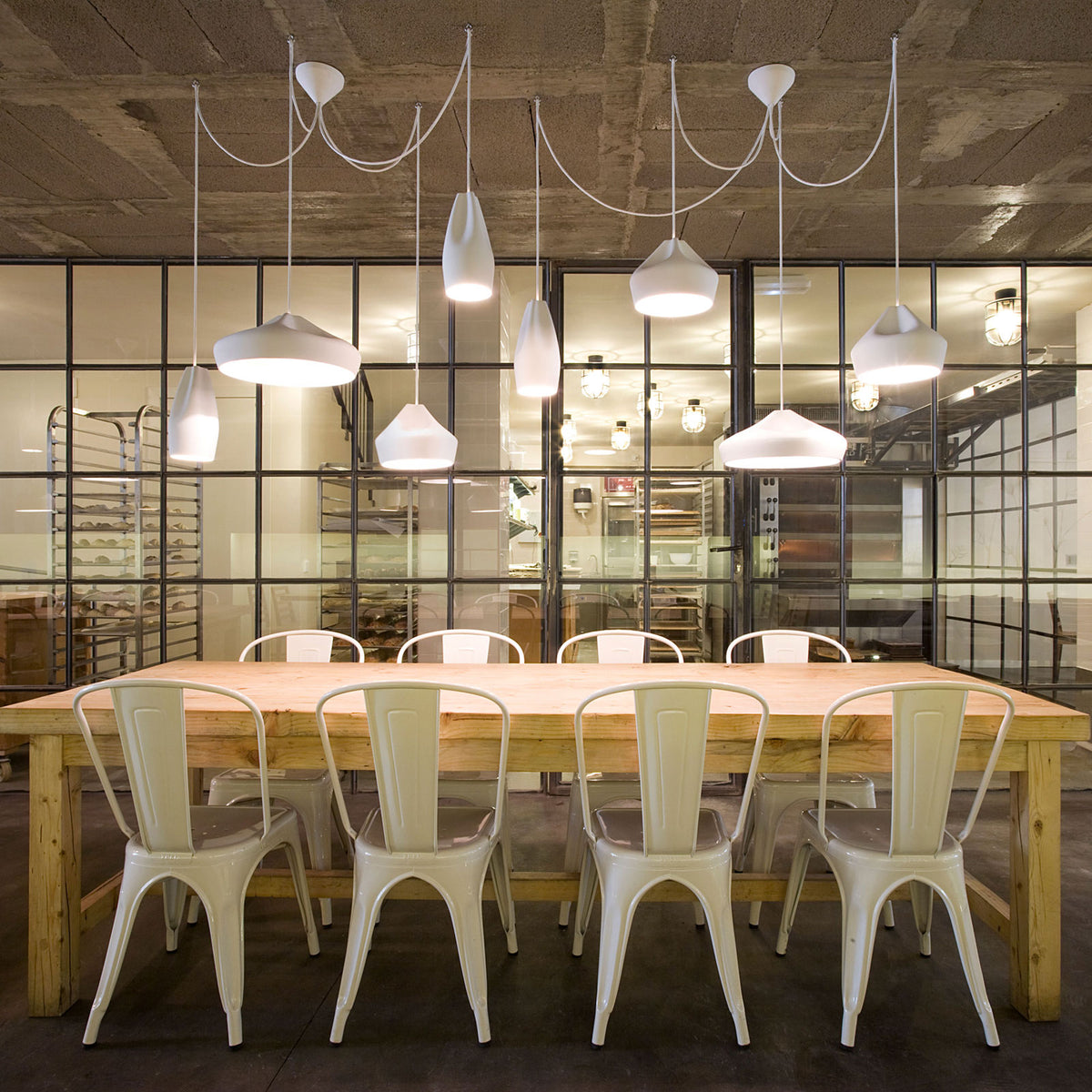 Pleat Box Pendant by Marset, showing pleat box pendants in live shot.