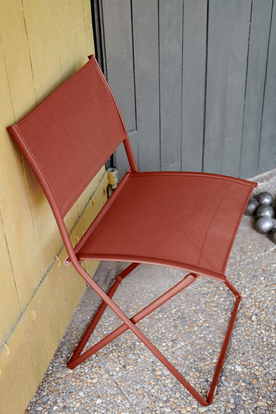 Plein Air Side Chair by Fermob, showing plein air side chair in live shot.