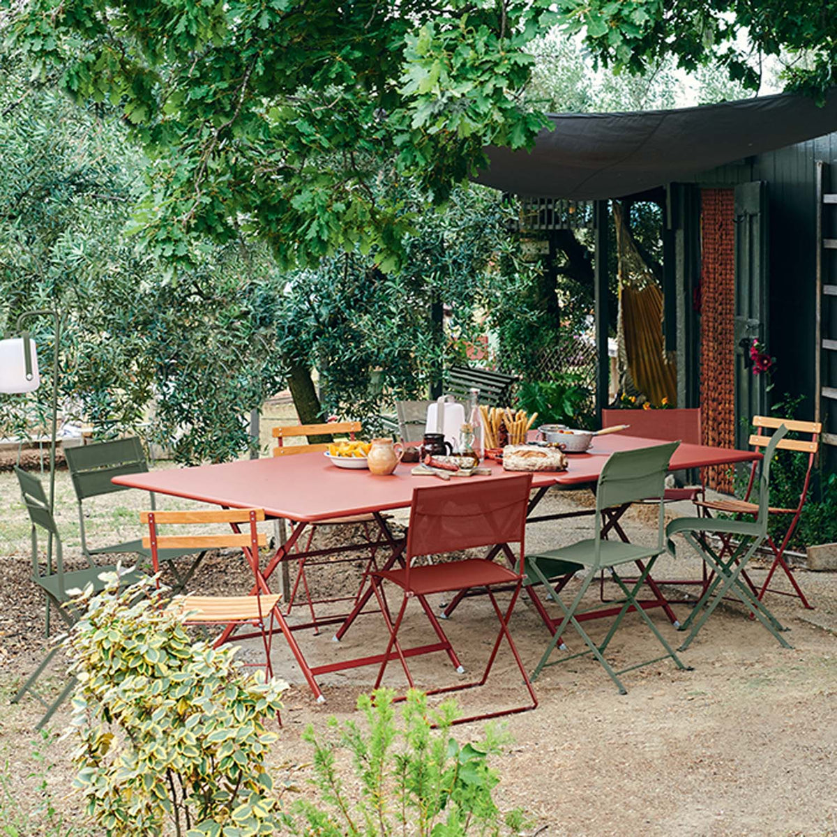 Plein Air Side Chair by Fermob, showing plein air side chair in live shot.