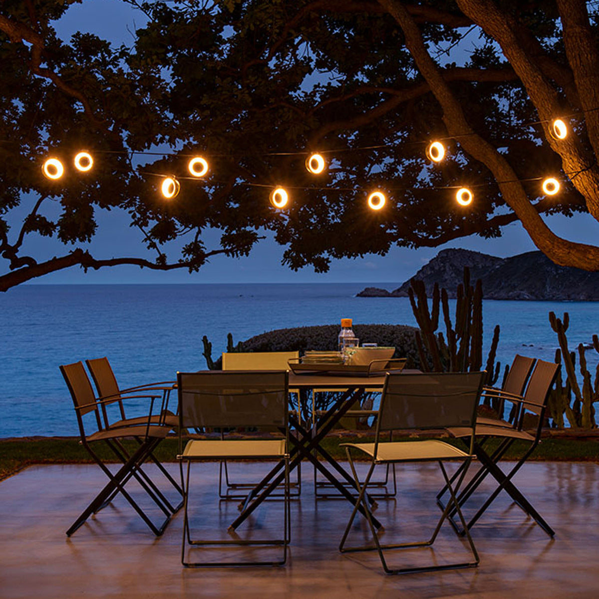Plein Air Side Chair by Fermob, showing plein air side chair in live shot.