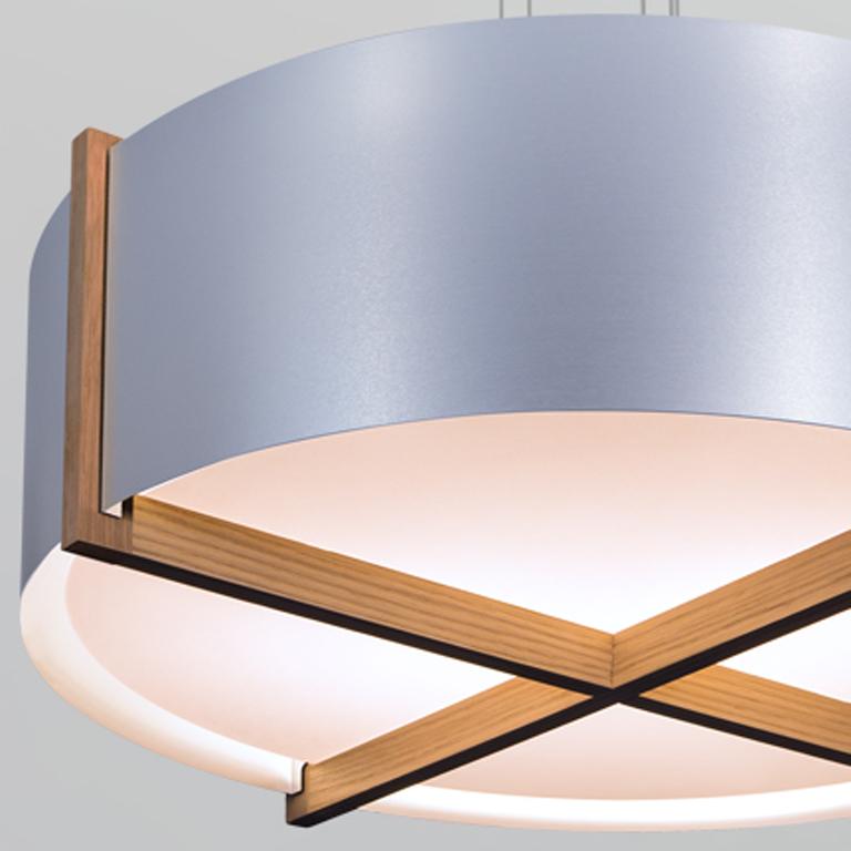 Plura 24" Pendant by Cerno, showing closeup view of plura 24" pendant in brushed aluminum shade, walnut wood.