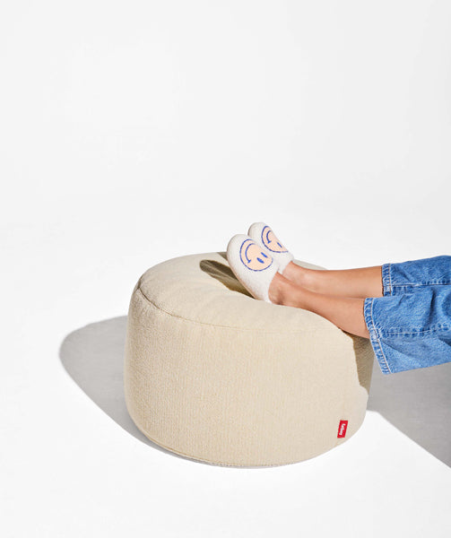 Point Large Sherpa Pouf by Fatboy, showing point large sherpa pouf in live shot.