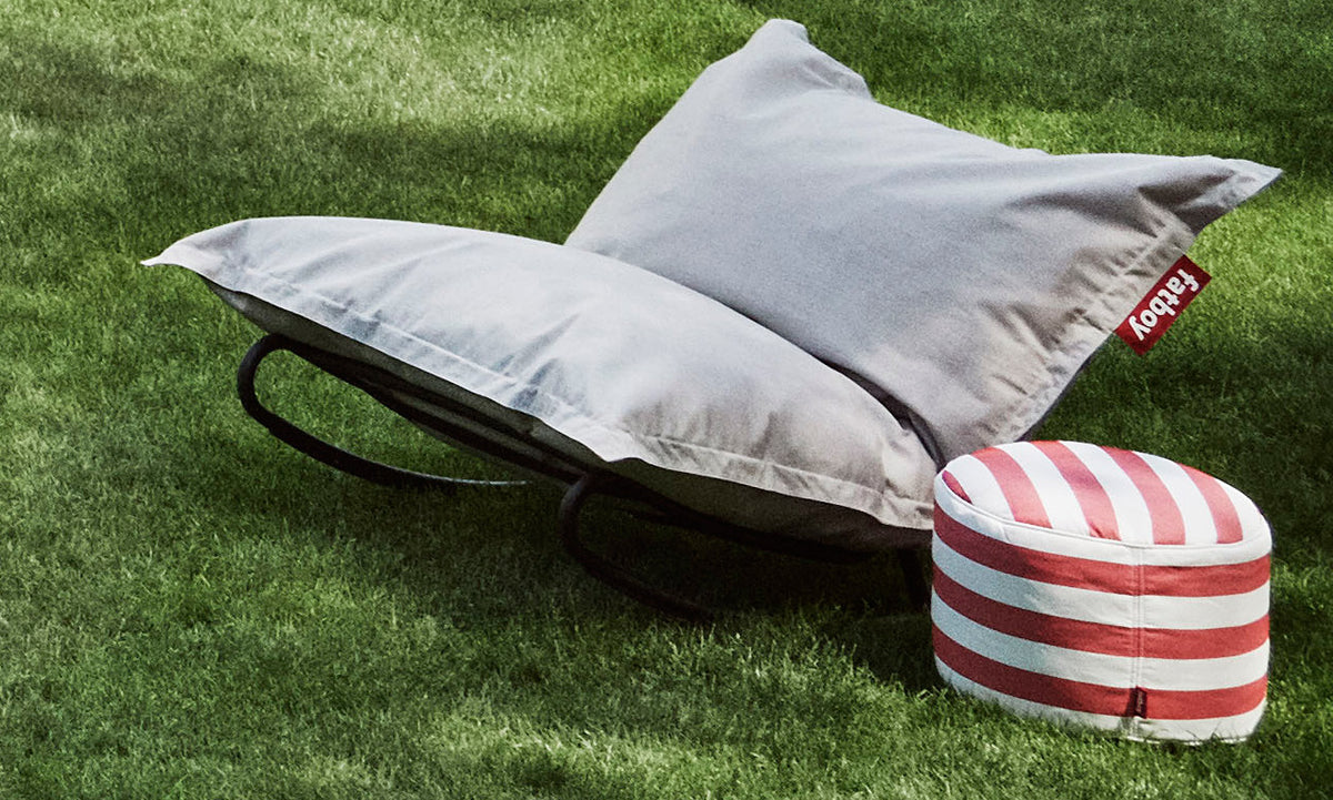 Point Outdoor Pouf/Ottoman by Fatboy, showing point outdoor pouf/ottoman in live shot.