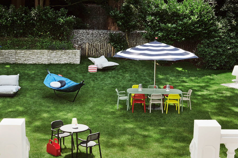 Point Outdoor Pouf/Ottoman by Fatboy, showing point outdoor pouf/ottoman in live shot.