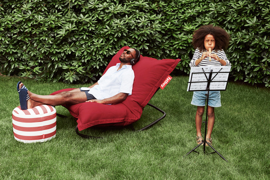 Point Outdoor Pouf/Ottoman by Fatboy, showing point outdoor pouf/ottoman in live shot.