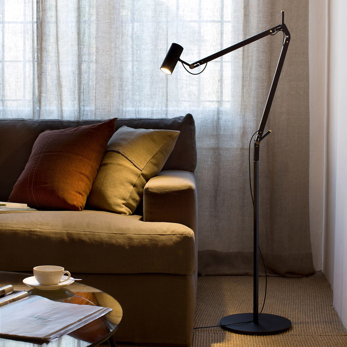 Polo Floor Lamp by Marset, showing polo floor lamp in live shot.